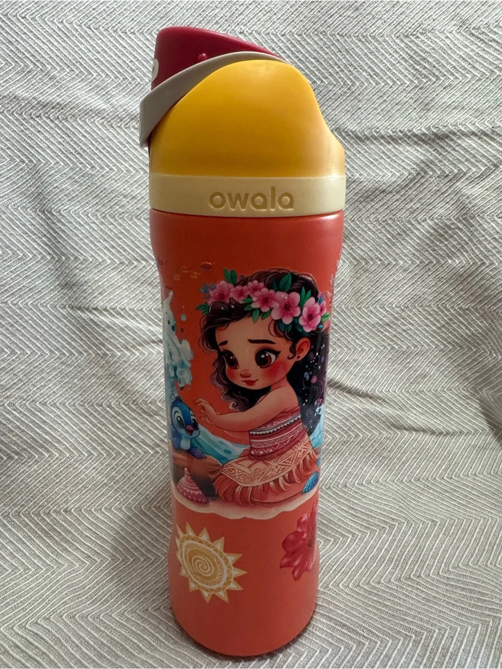 Owala Stainless Steel Water Bottle with Moana graphic design.